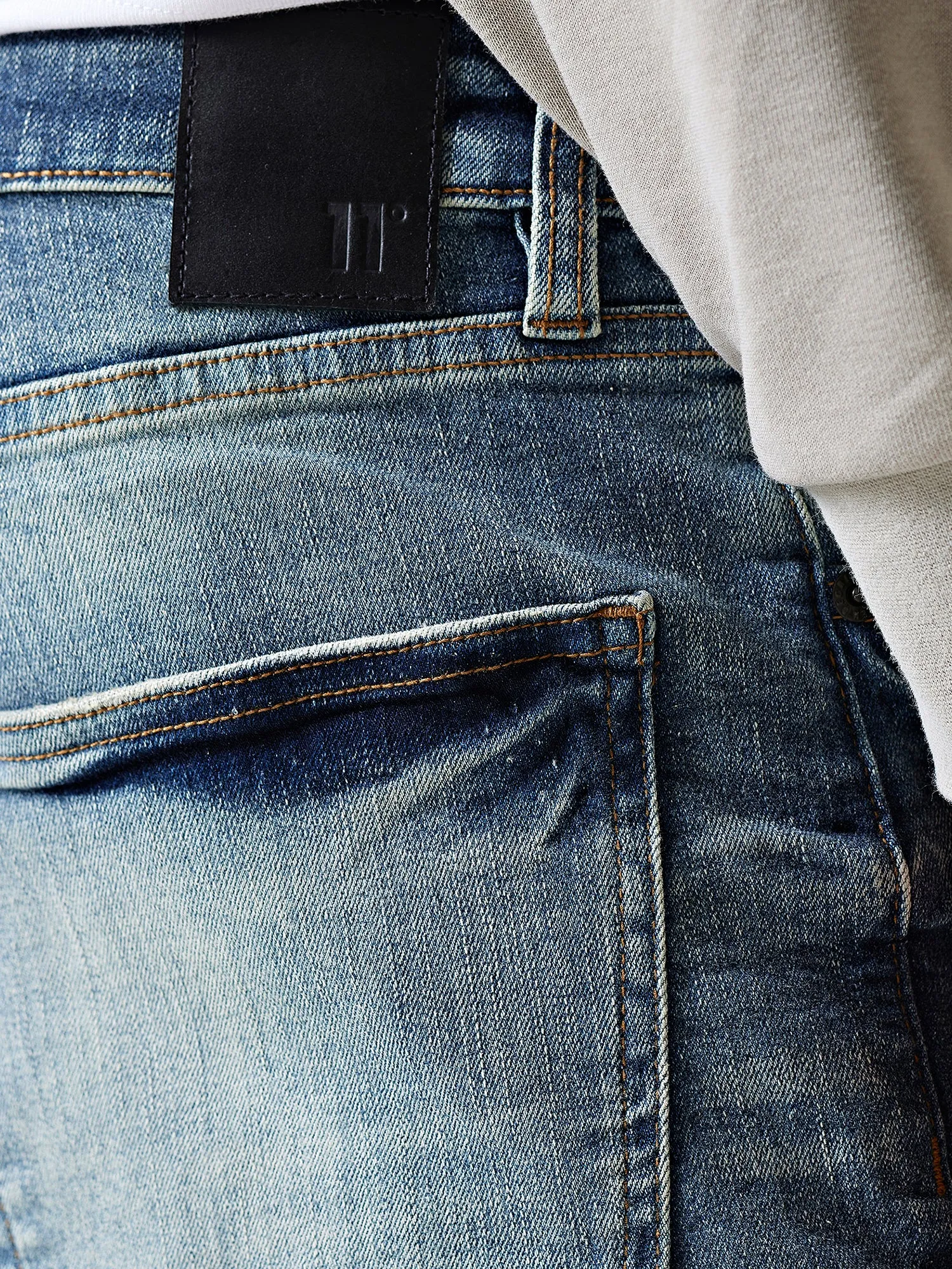 Sustainable Premium Ripped Jeans - Mid Blue Slub